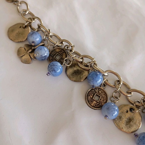 Handmade bracelet with blue stones and silver details