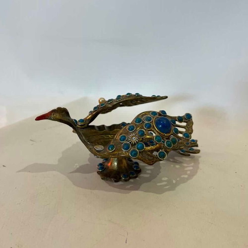 Vintage brass peacock ashtray with decorative stones used