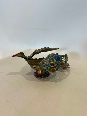 Vintage brass peacock ashtray with decorative stones used