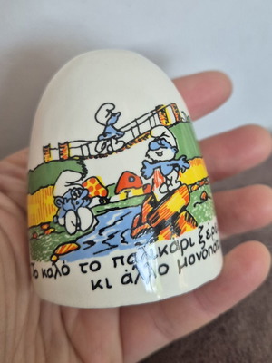 Smurf ceramic salt shaker, Greek proverb design