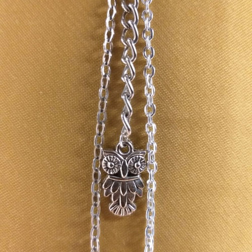 Single earring new with hoop and long chain, of wisdom, peace and love