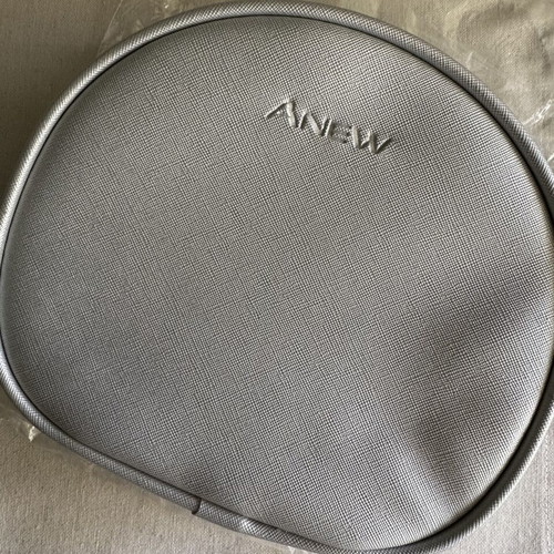Avon toiletry bag new, silver