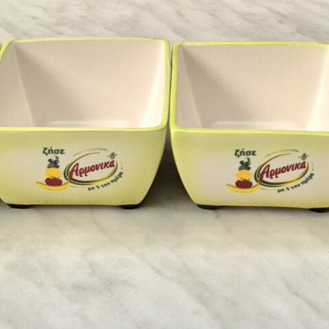 Ceramic bowls set of 4 new, light green with designs