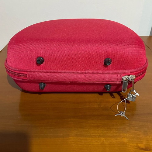 Travel toiletry bag used, red
