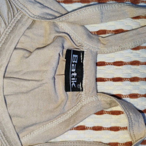 Beige tank top with straps like new, size medium