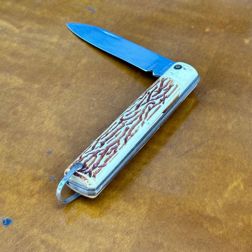 Vintage Tramontina folding knife from Brazil, used, decorative handle