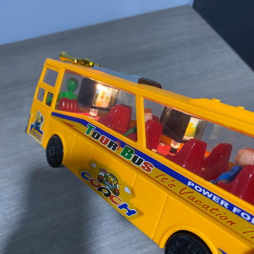 Toy bus used with lights and sound
