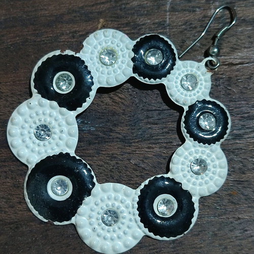 Metal earrings like new, circular design with crystals
