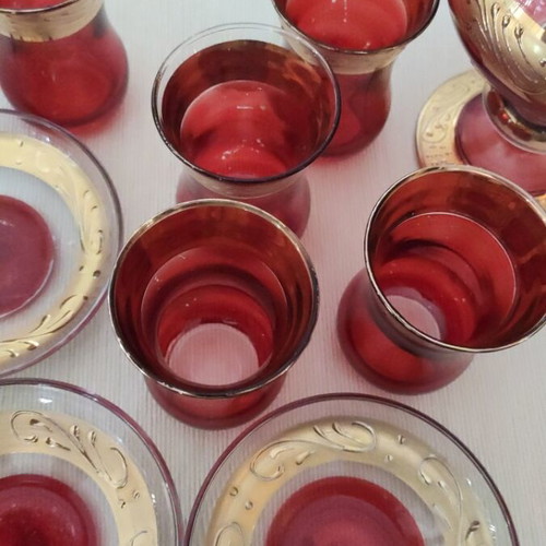 Vintage red glass liqueur tea set with gold used