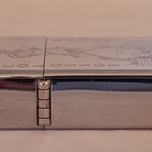 Zippo Colossus of Rhodes lighter used, laser engraved, made in USA