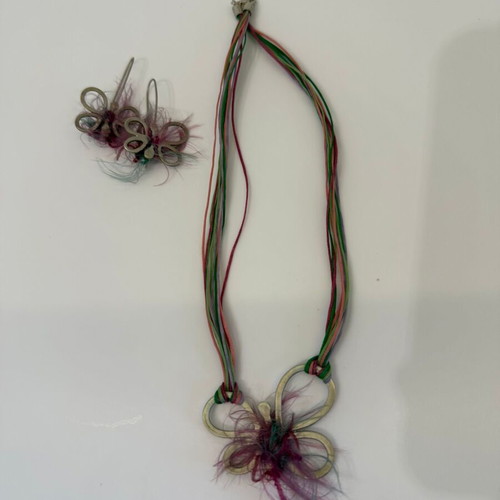 Handmade necklace and earrings set with butterfly and colorful fabric fibers