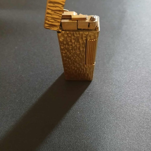 Dunhill Rollagas lighter used with goldplated finish and embossed design