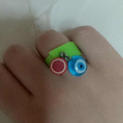 Ring with eye and watermelon charm like new, green multicolor