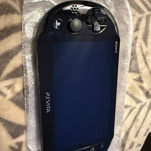 PS Vita Slim Model 2004 handheld console, brand new