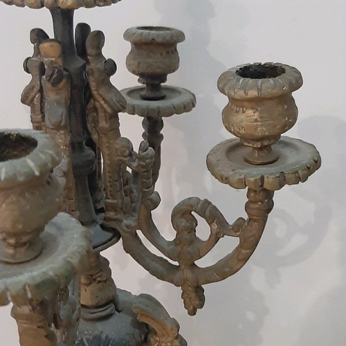 Bronze candlesticks used, pair with patina and carved base