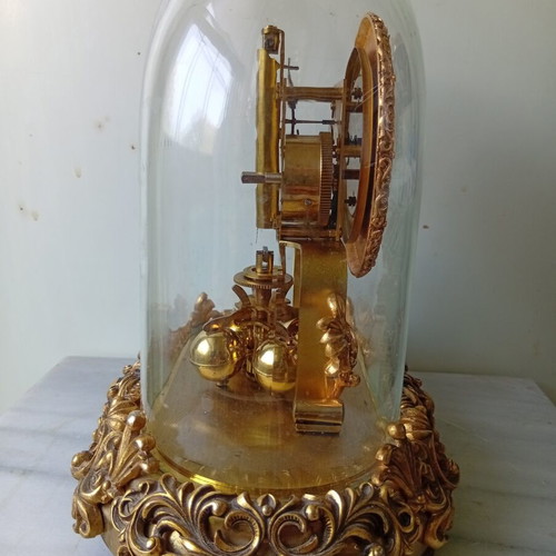 400-day mechanical clock with glass dome