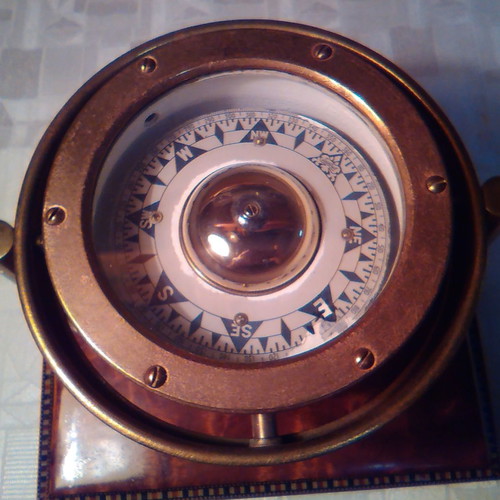 Sestrel brass compass used with wooden base