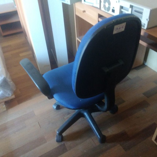 Computer desk with used office chair and wheels