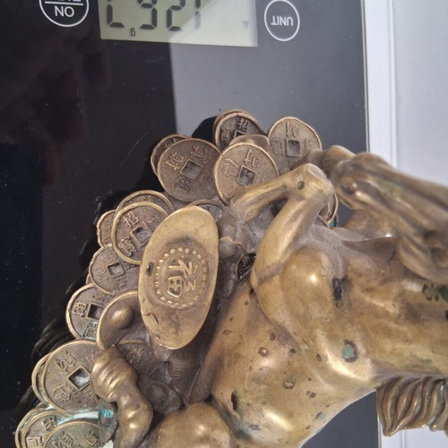 Bronze horse sculpture used, vintage wealth symbol on coins