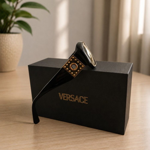 Versace collectible sunglasses, black lenses and frame