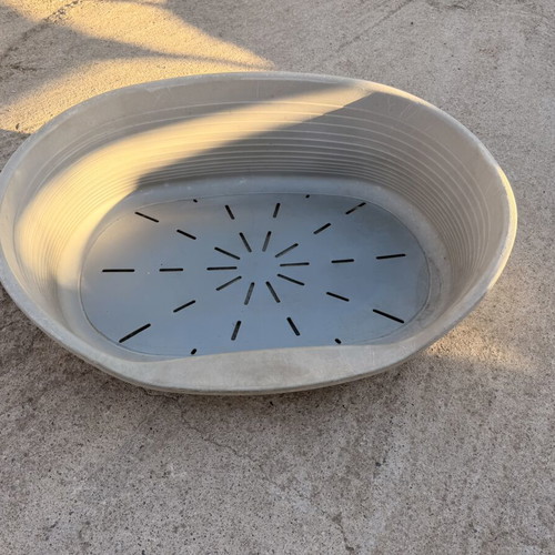 Large plastic dog bed used, outdoor weatherproof