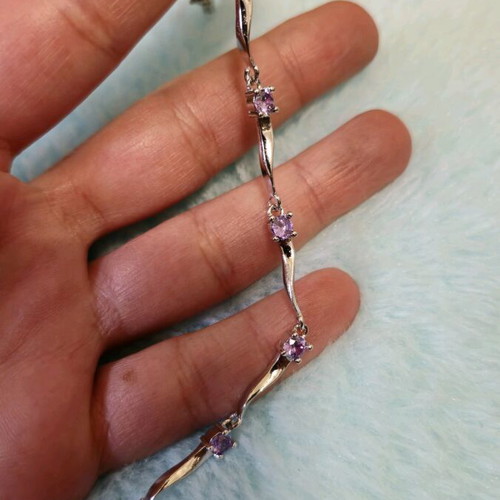 Fairy bracelet like new with purple stones and silver chain