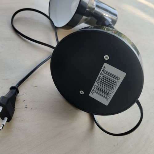 Black table lamp with flexible neck and bulb
