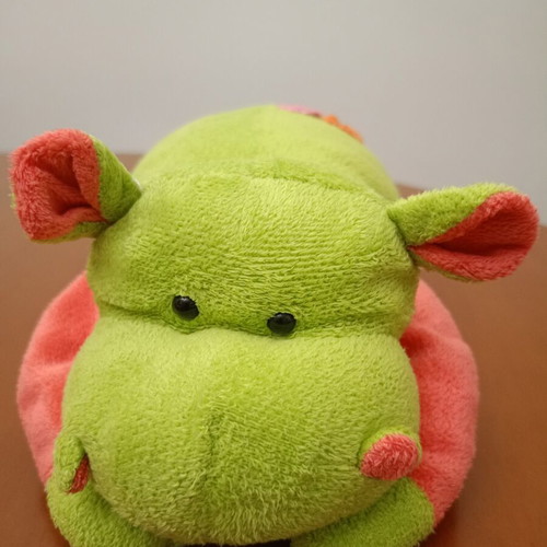 Plush Hippopotamus with Flowers like new, green and coral