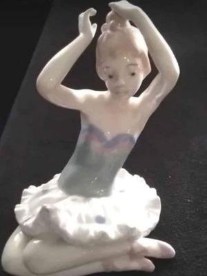 Porcelain new, flawless expressive figurine