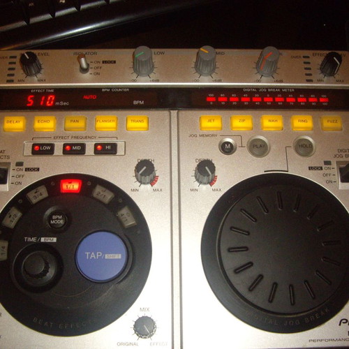 Pioneer DJM-500 mixer and Pioneer EFX500 silver effect processor used
