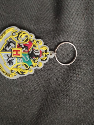 Harry Potter Pyramid Hogwarts Crests keychain unused, rubber material