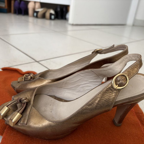 Peep toe heels used, size 38, bronze with leather knot detail