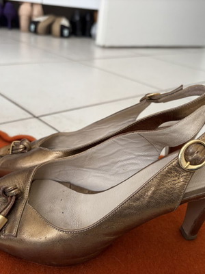 Peep toe heels used, size 38, bronze with leather knot detail