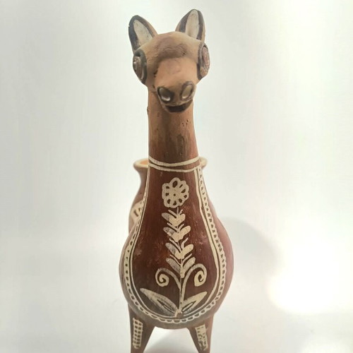 Handmade traditional Peruvian ceramic vessel in llama shape, like new