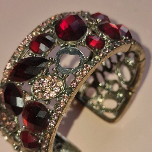 Bracelet used with pink and red stones, some stones missing
