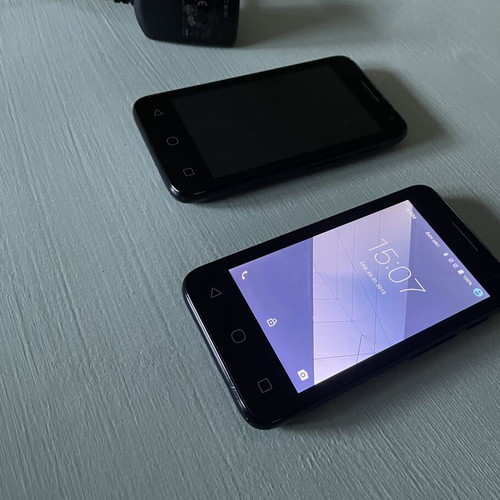 Alcatel One Touch two used smartphones with charger, dual SIM