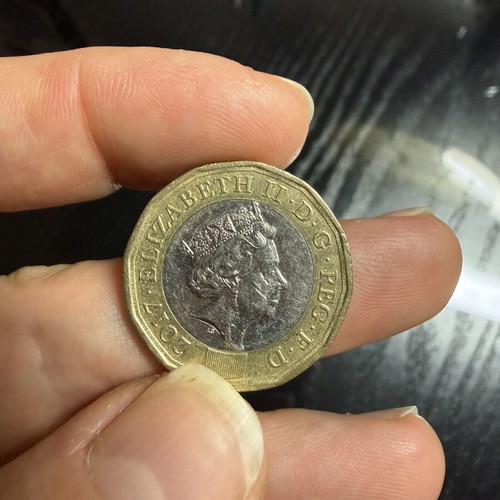 British one pound coin, dodecagonal 12-sided, 2017 design
