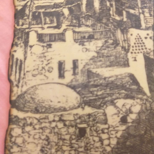 Wall-mounted old woodcut of the old city of Jerusalem