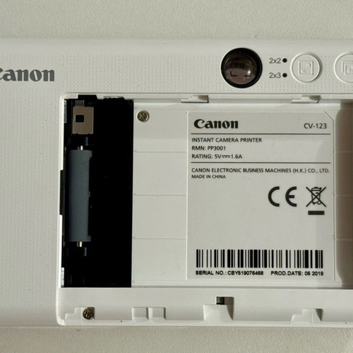 Canon Zoemini C camera used, pink Polaroid-style with internal battery repair needed