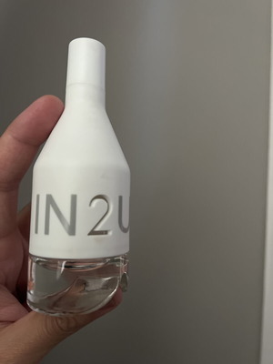 IN2U perfume bottle used, empty