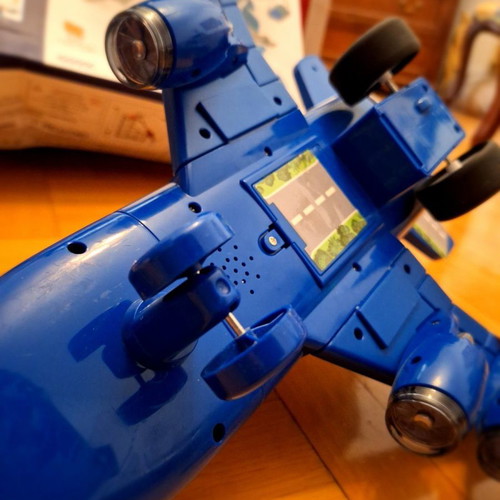 Airplane toy used with lights and sounds, transforms into station