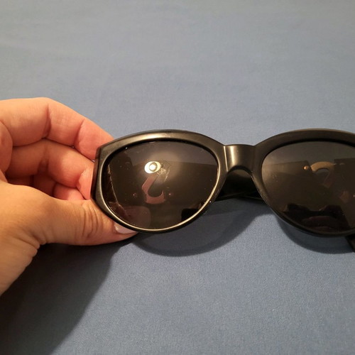 Yves Saint Laurent sunglasses used, black with gold logo