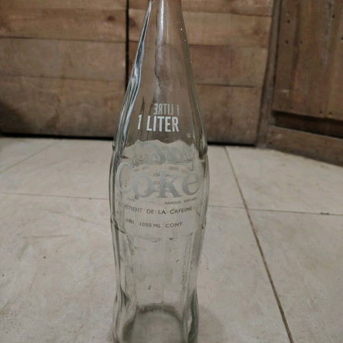 Coca-Cola bottle French like new with original cap