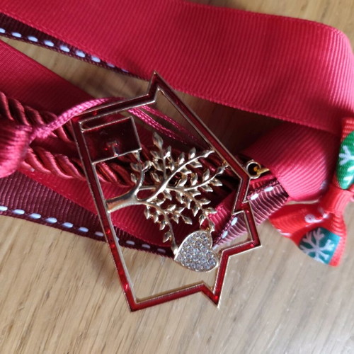 Handmade red - gold good luck charm like new
