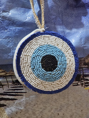 Handmade wallet with zipper, beads and eye design