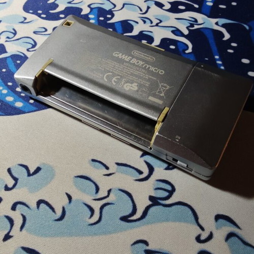 Gameboy Micro with new 2300mAh battery and USB charger