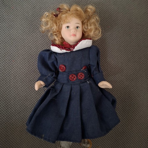 Porcelain doll small used, decorative for baby room or gift