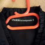 Black satin blouse like new with neckline opening, sizes L/XL
