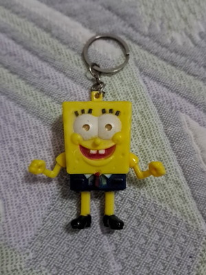 SpongeBob keychain used, blue and yellow