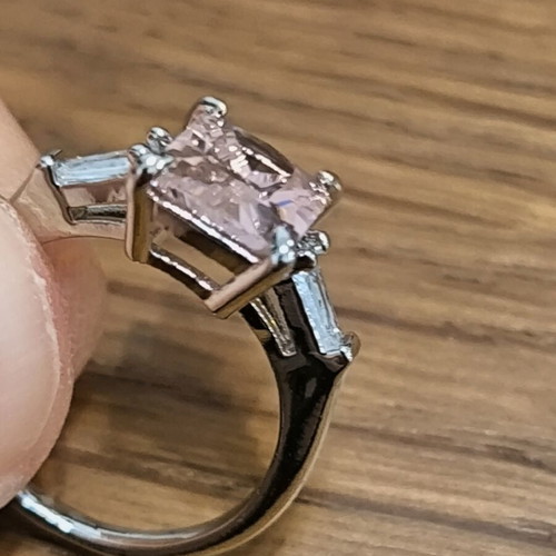 Ring with pink rectangular zircon and silver plating